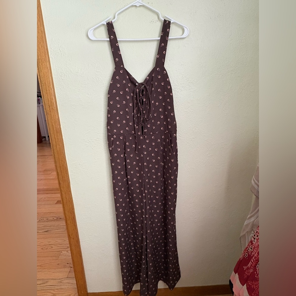 Gray Jumpsuit with Patterned Design—good condition. A couple of pulled spots
